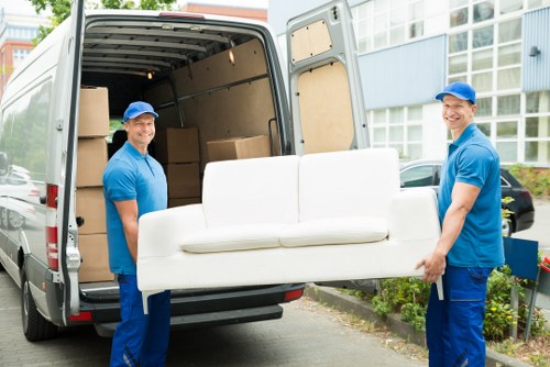 Professional packing service preparing boxes for a home move in Belsize Park