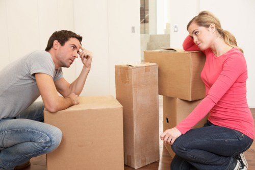 Local moving team handling boxes and household items in Belsize Park