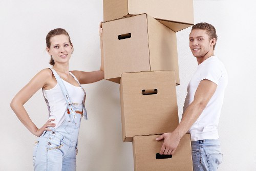 Worker using proper manual handling and lifting technique