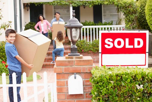 Professional man and van safety and insurance practices in Belsize Park
