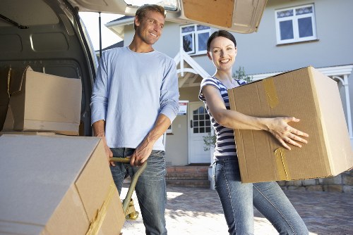 Loading furniture into a van for a move in Belsize Park